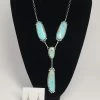 The Sparkling Spur 4 Stone Necklace & Earring Set Jewelry
