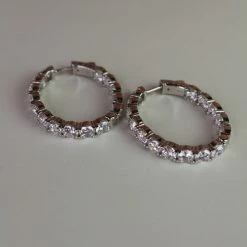 The Sparkling Spur New Arrivals Medium Oval CZ Diamond Hoop Earrings